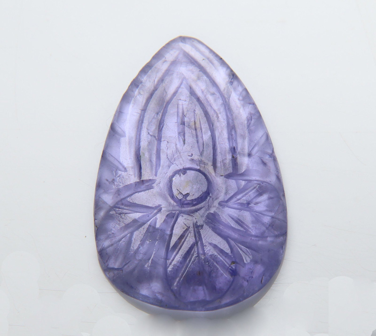 Beautiful AA color 7.62 Cts Natural Tanzanite Carving: No Reserve! Title: Beautiful AA color 7.62 Cts Natural Tanzanite Carving Additional Information: Gemstone : Natural Tanzanite Carving Origin: Tanzania Weight : 7.62 carats Dimensions : 22.54x14.15x2.7