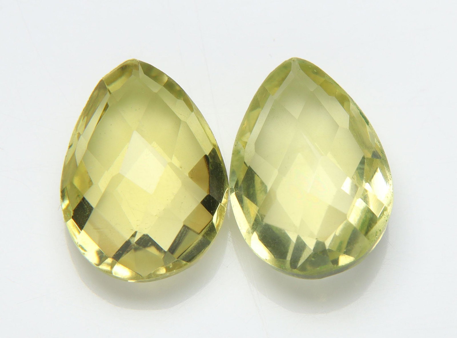 AAA9.93 Cts Natural Lemon Quartz Lot: No Reserve! Title: AAA9.93 Cts Natural Lemon Quartz Lot Additional Information: Gemstone : Natural Lemon Quartz Shape and cut : Pear Briolette Origin : Africa Weight : 9.93 carats Measurements : 14x10