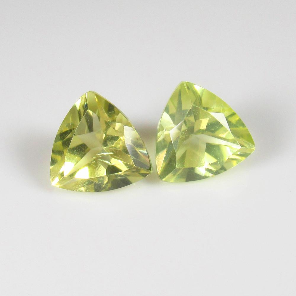 Natural Lemon Quartz Pair - 3.33 Ct: No Reserve! Title: Natural Lemon Quartz Pair - 3.33 Ct Origin: Africa Weight: 3.33 Size/Dimensions: 8.0 x 8.0 x 5.0 mm Additional Information: Pieces : 2 No's / Shape : Trillion Cut / Color : Greenish