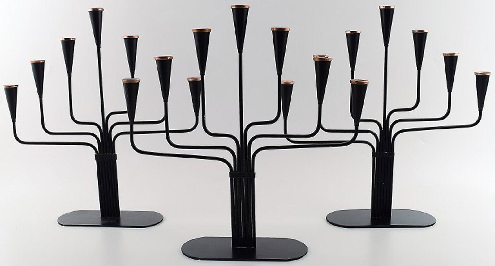 3 large Ystad metall, Gunnar Ander, seven armed Swedish design candlesticks in metal with brass top.: Title: 3 large Ystad metall, Gunnar Ander, seven armed Swedish design candlesticks in metal with brass top. Description: 3 large Ystad metall, Gunnar Ander, seven armed Swedish design candlesticks in