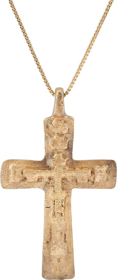 FINE EASTERN EUROPEAN CROSS, 17TH-18TH CENTURY.: Ukrainian or Russian. Gilt bronze, just under 1 7/8" in height. Modeled in high relief. raised central cross with no Corpus Christi. The beam terminals with “crutches” making five crosses 