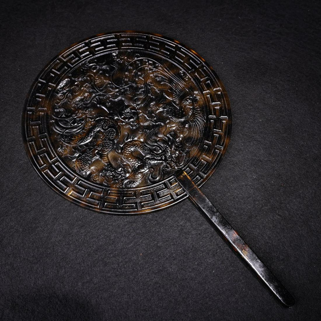 A Tortoiseshell High Relief Dragon and Phoenix Fan (1 of 9)