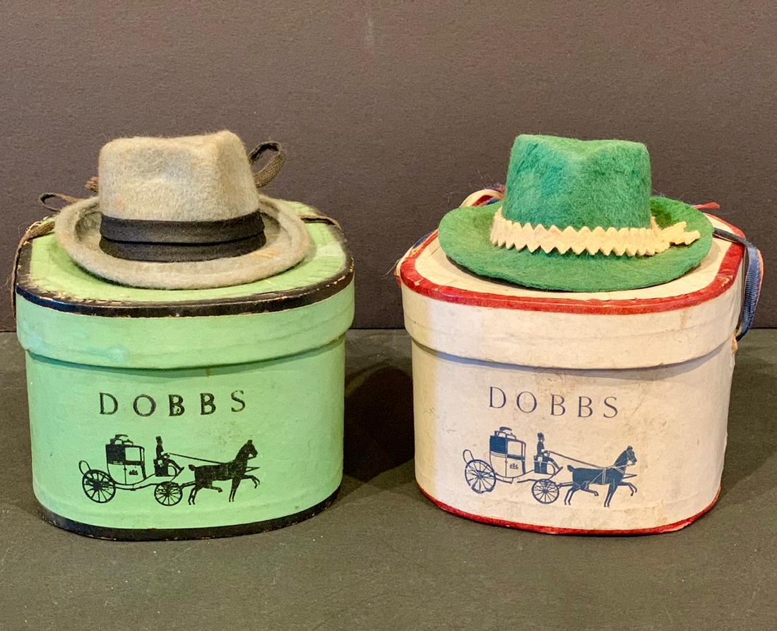 Pair Miniature DOBBS Hats in Hatboxes, early 20th c: Title: Pair Miniature DOBBS Hats in Hatboxes, early 20th c Dimension: 5 in x 5 in x 4 in Date/Period: Early 20th c Additional Info:Ostensibly used to hold Gift Certificates for their finest Clientele,