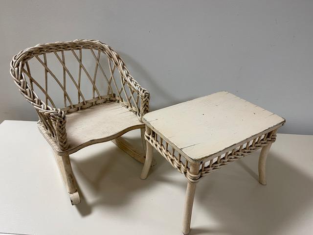 WICKER AND WOOD DOLL CHAIR AND TABLE IN ORIGINAL WHITE PAINT ,C.1930: 9-1/2” TO TOP OF CHAIR; 8” ACROSS ARM TO ARM - TABLE, 9X 6 TALL- 6-1/4” H Shipping: Domestic: Flat-rate of $25.00 to anywhere within the contiguous U.S. International: Foreign shippi
