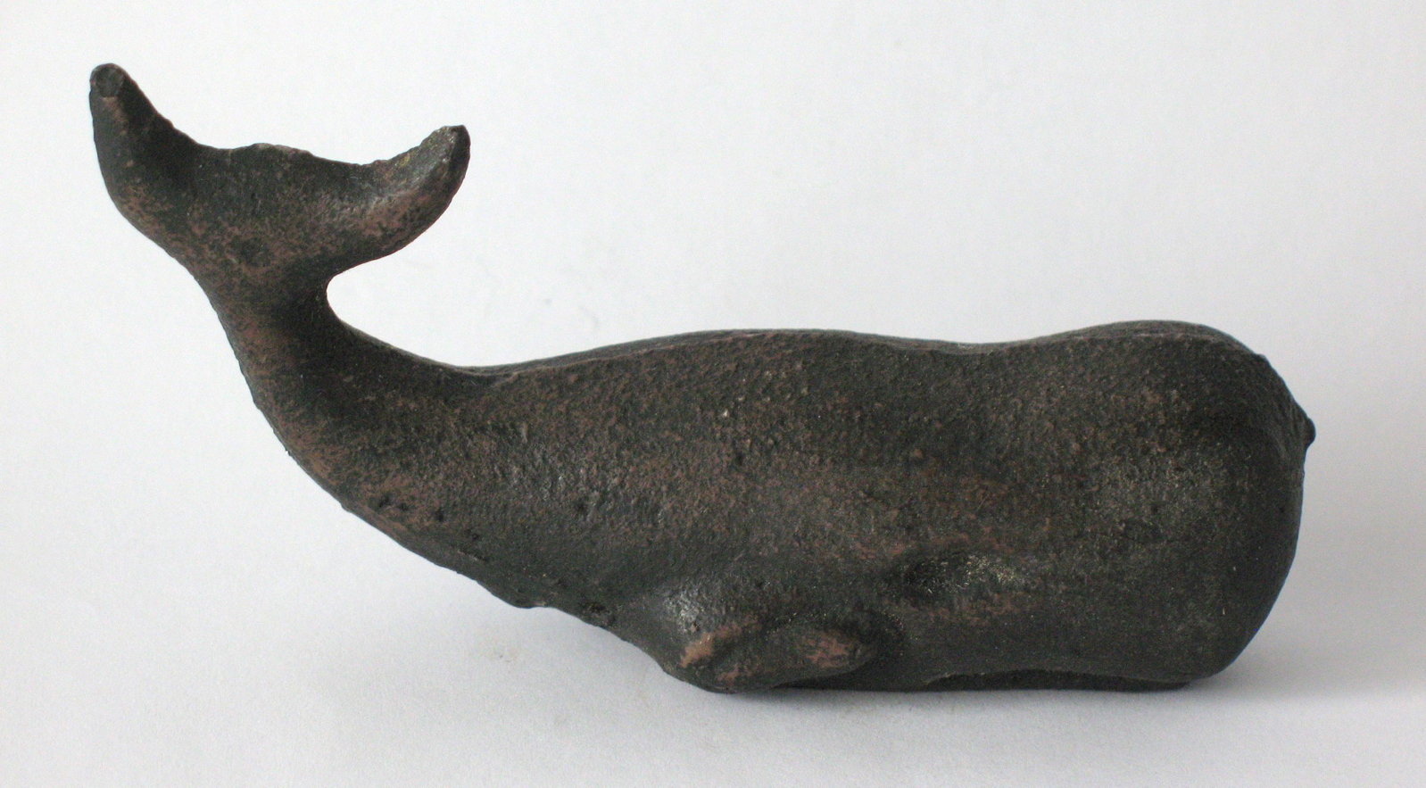 Vintage cast iron whale chart weight: Title: Vintage cast iron whale chart weight Date/Period: 1950's Dimension: 4 1/2” long Additional Information: Nice vintage cast iron whale chart weight in great original condition. Shipping: Do