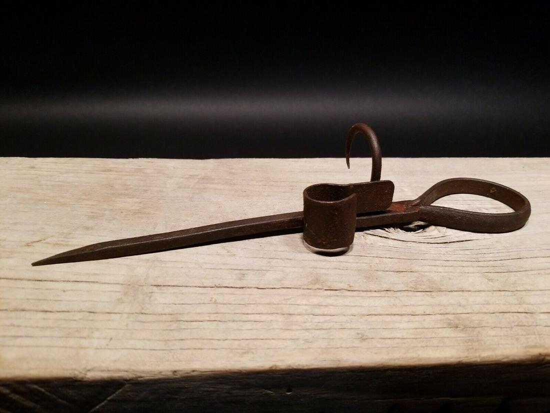 Wrought Iron Mining Sticking Tommy Miners Candlestick: 10 1/2" Long Nice Reproduction iron miners candle holder. Great handmade distressed to look like an antique.... Miner spikes like this were used in the mining trade & era. The spike would be hammered 