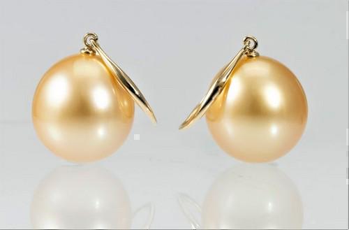 13mm Deep Golden South Sea Pearls: Title: 13mm Deep Golden South Sea Pearls Description: Produced by the gold-lipped Pinctada Maxima Oyster in the warm waters off the coasts of Australia, these pearls have a natural magnificent deep go
