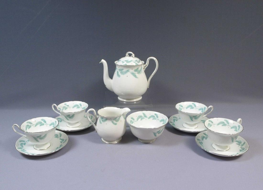 Shelley SERENITY Coffee Tea set Cups Sugar Creamer Teapot 13791 Platinum Silver: Anton Anderson Memorial Tunnel This is a beautiful and timeless Coffee/Tea set for 4 (four) made by Shelley England in the Serenity Pattern. This pattern is with green leaves and platinum/silver rim.