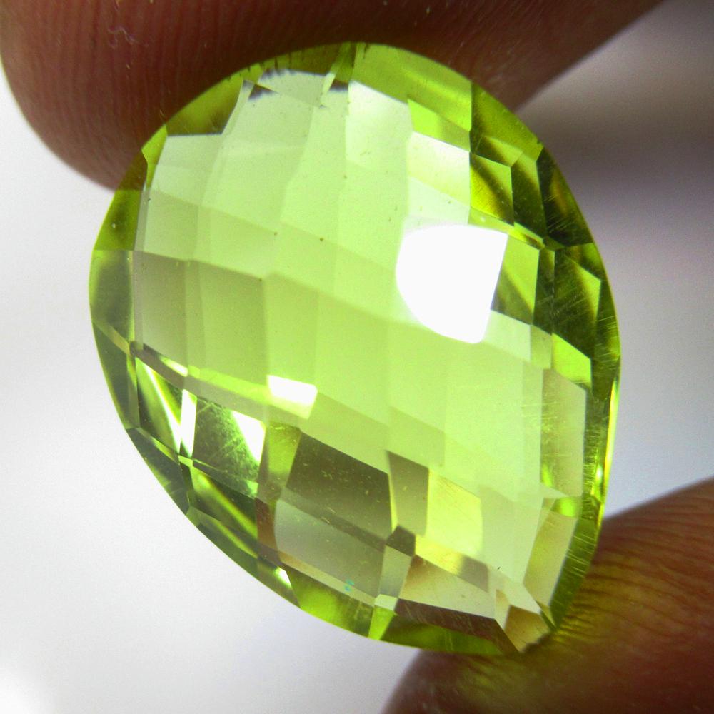 13.30 Ctw Natural Lemon Quartz Pear Checkerbaord Cut: No Reserve! Title: 13.30 Ctw Natural Lemon Quartz Pear Checkerbaord Cut VVS Gemstones: Natural Lemon Quartz Carat Weights: 13.3 Size/Dimensions: 18.60 x 14.60 x 9.20 mm Additional Information: Top Cla