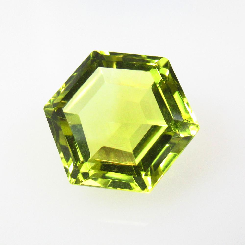 7.54 Ctw Natural Lemon Quartz Hexagon Cut: No Reserve! Title: 7.54 Ctw Natural Lemon Quartz Hexagon Cut Stone Clarity: VVS Gemstones: Natural Lemon Quartz Carat Weights: 7.54 Size/Dimensions: 12.10 x 12.10 x 7.70 mm Additional Information: Goo