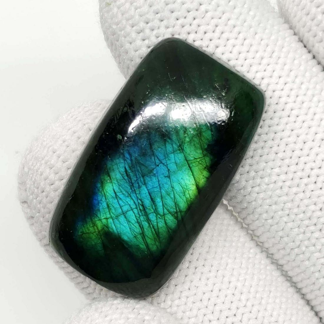 41.90 Ct "Stunning" Green Fire Labradorite: No Reserve! Title: 41.90 Ct "Stunning" Green Fire Labradorite Description: Gemstones: Natural Labradorite Carat Weights:41.90 ct Size/Dimensions: 29 X 17 X 9 mm Treatment: Color Dyed Gemstone: Labrado