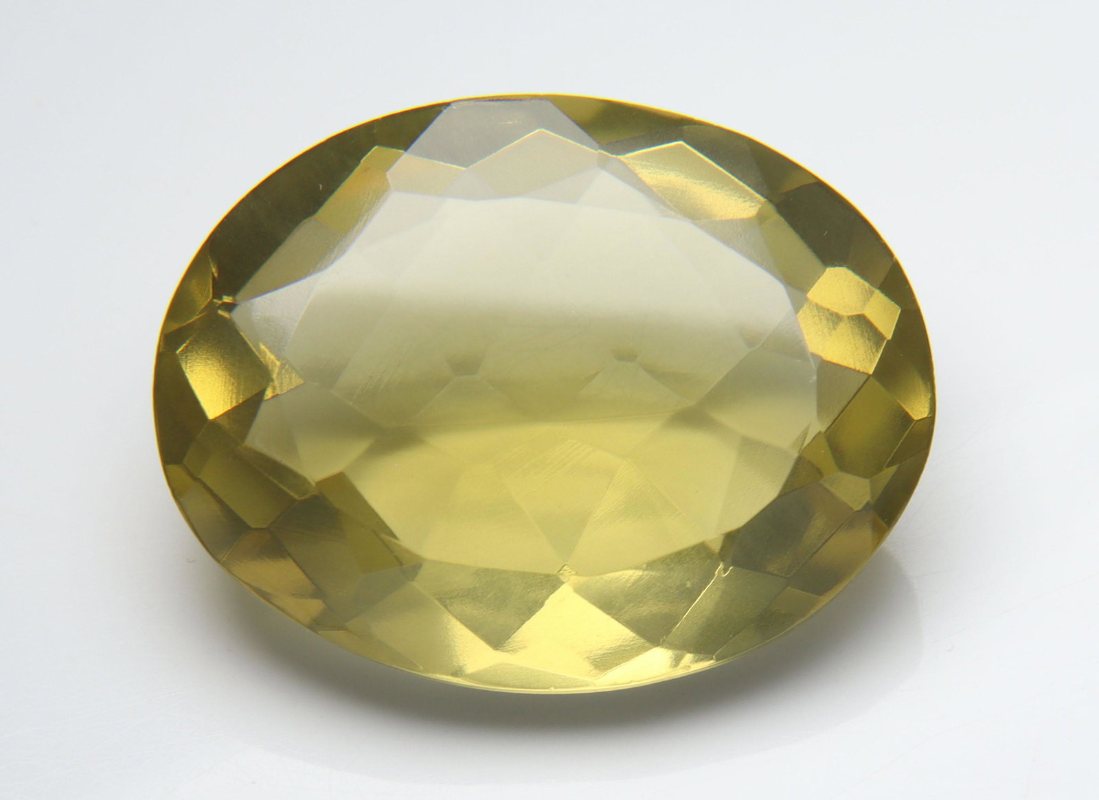 32.85 Cts Natural Lemon Quartz: No Reserve! Title: 32.85 Cts Natural Lemon Quartz Additional Information: Gemstone : Natural Lemon Quartz Shape and cut : Oval Cut Origin : Africa Weight : 32.85 carats Measurements : 25x20 mm Color :