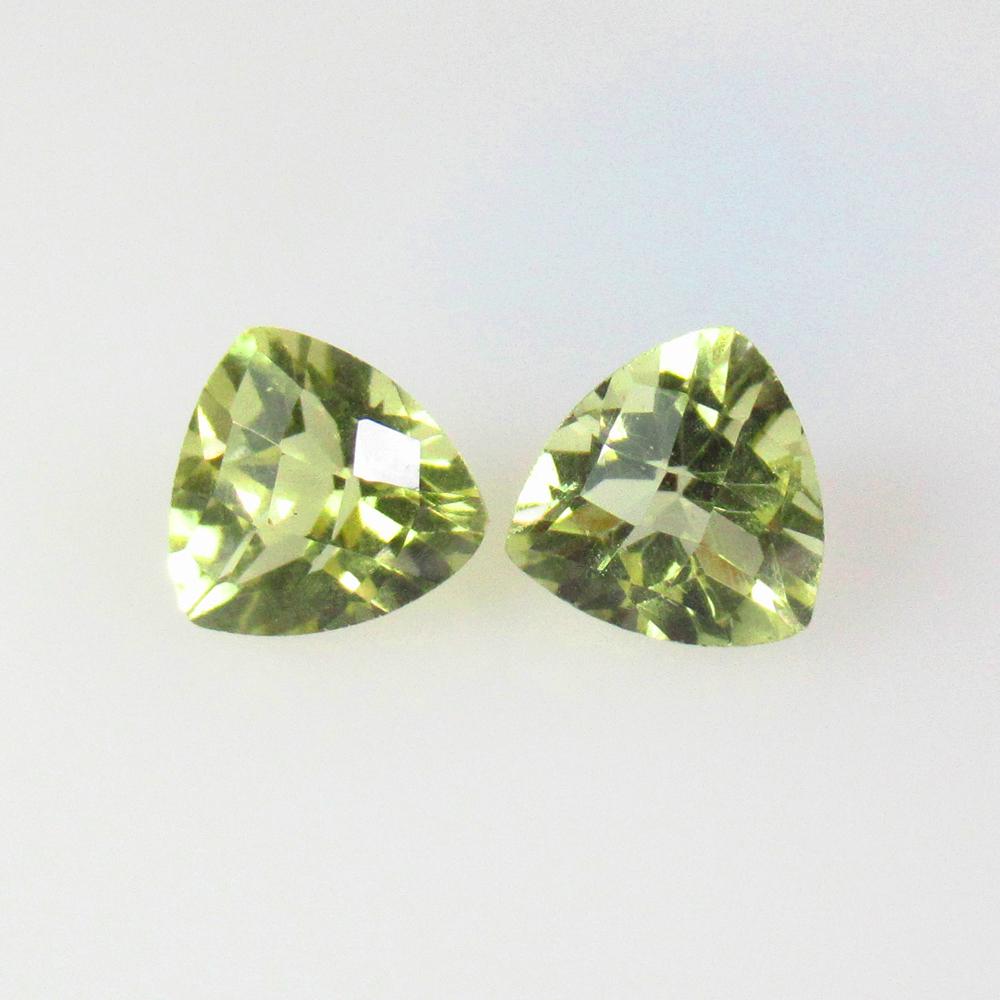 3.87 Ctw Natural Lemon Quartz Trillion Pair: No Reserve! Title: 3.87 Ctw Natural Lemon Quartz Trillion Pair Stone Clarity: VVS Gemstones: Natural Lemon Quartz Carat Weights: 3.87 Size/Dimensions: 8.20 x 8.20 x 6.20 mm / 2 P'cs Additional Informa