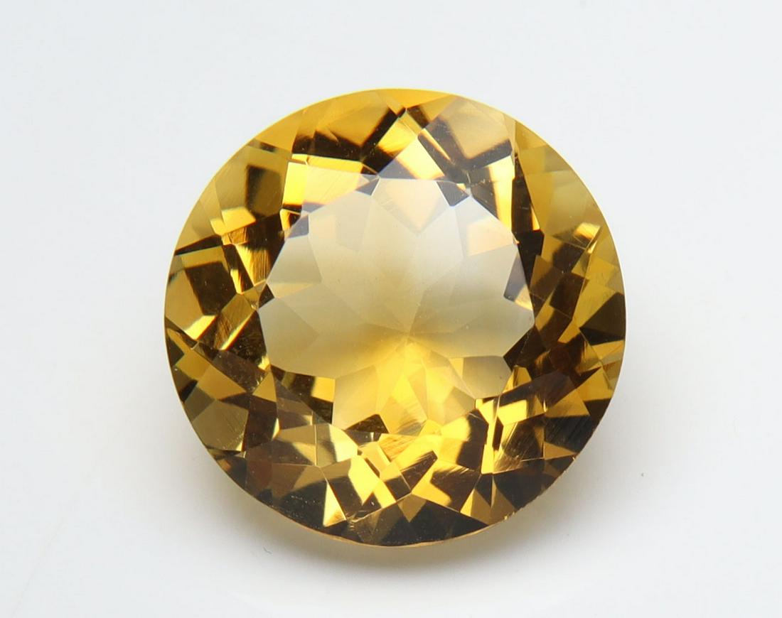 3.68 Cts Natural Citrine: No Reserve! Title: 3.68 Cts Natural Citrine Additional Information: Gemstone : Natural Citrine Origin : Brazil Weight : 3.68 carats Measurements : 10.65-10.60x6.20 mm, Shape/Cut : Round Cut Color : Ye