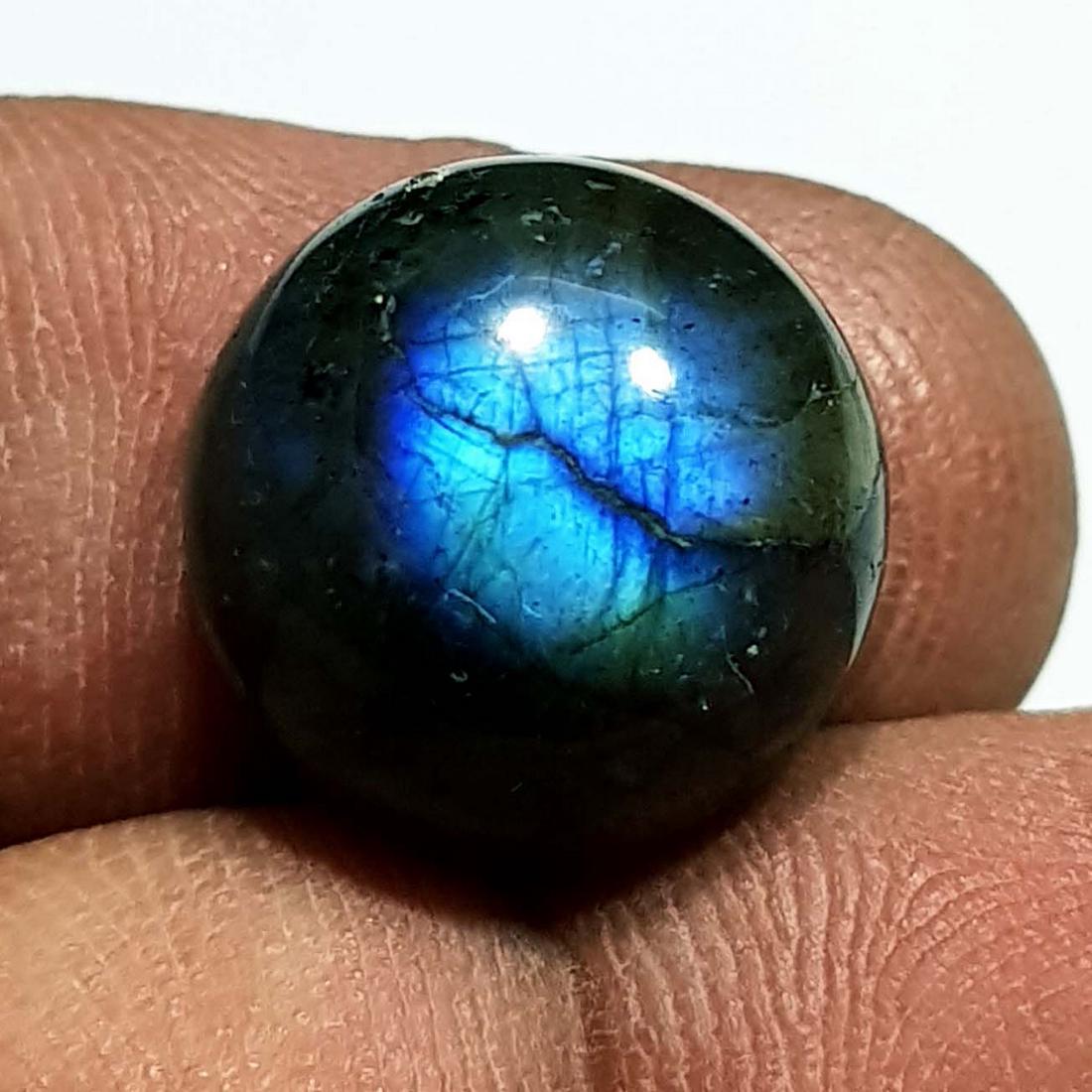 13.17 Ctz Natural Labradorite: No Reserve! Title: 13.17 Ctz Natural Labradorite Color/Clarity: Bluish Green / Semi Transparent Gemstones: Labradorite Carat Weights: 13.17 Size/Dimensions: 14.00 x 14.00 x 8.00 Additional Information