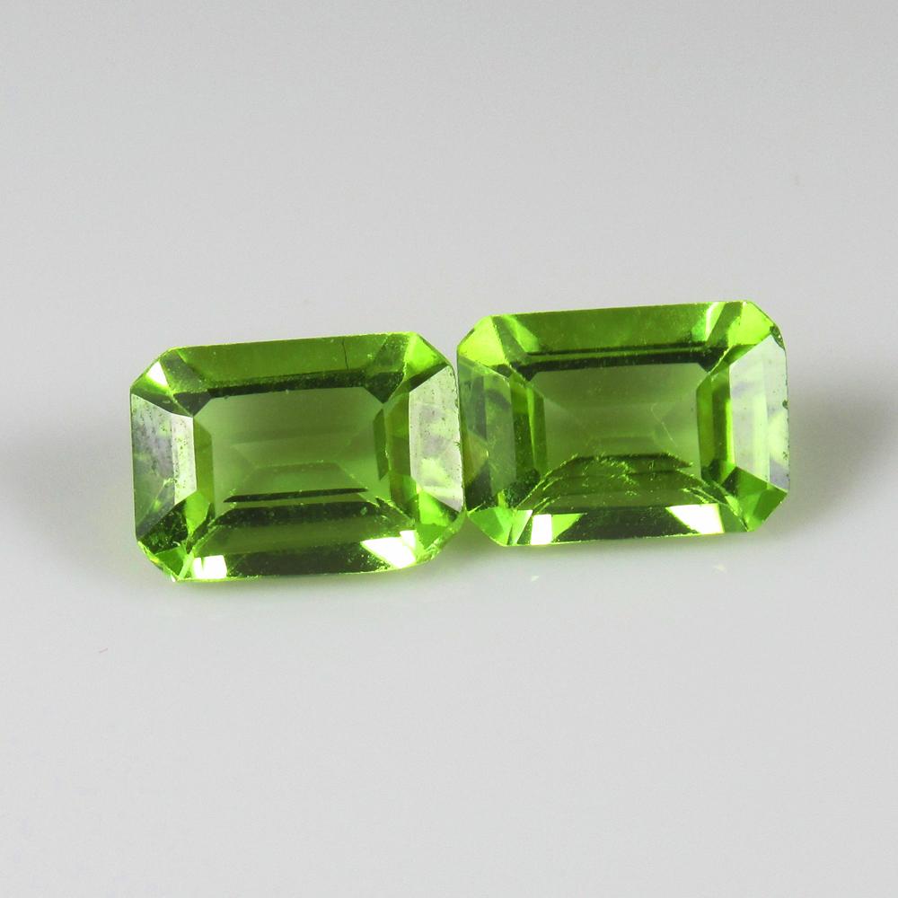 Natural Green Peridot Pair- 1.57 Ct: No Reserve! Title: Natural Green Peridot Pair- 1.57 Ct Origin: Pakistan Weight: 1.57 Size/Dimensions: 6.7 x 5.0 x 3.0 mm Additional Information: Pieces : 2 No's / Shape : Octagon Cut / Color : Green /