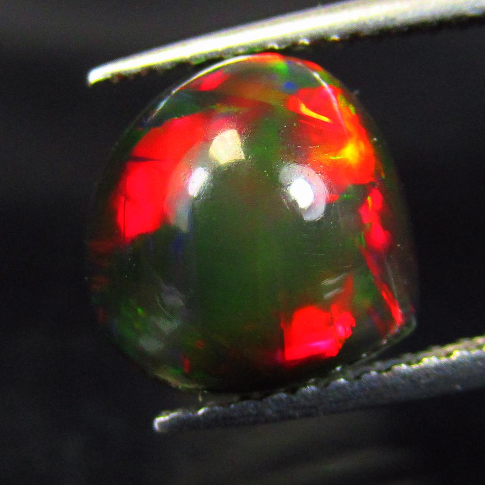 1.97 Ctw Natural Black Fire Opal Pear Cab (1 of 2)