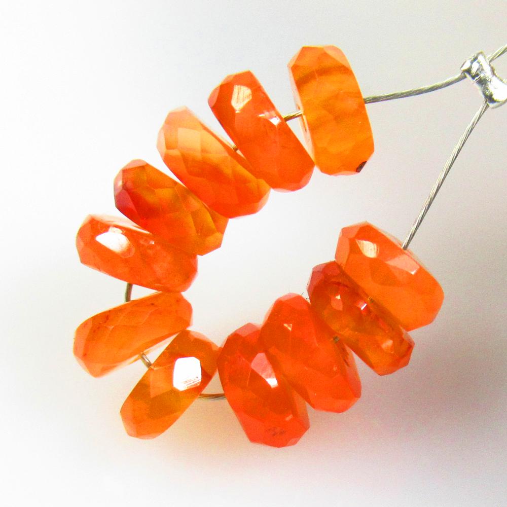 8.00 Ctw Natural 11 Orange Carnelian Round Beads: No Reserve! Title: 8.00 Ctw Natural 11 Orange Carnelian Round Beads Stone Clarity: Semi-Transparent Gemstones: Natural Carnelian Beads Carat Weights: 8 Size/Dimensions: 5.70 - 6.10 mm / 11 Pc's Additi