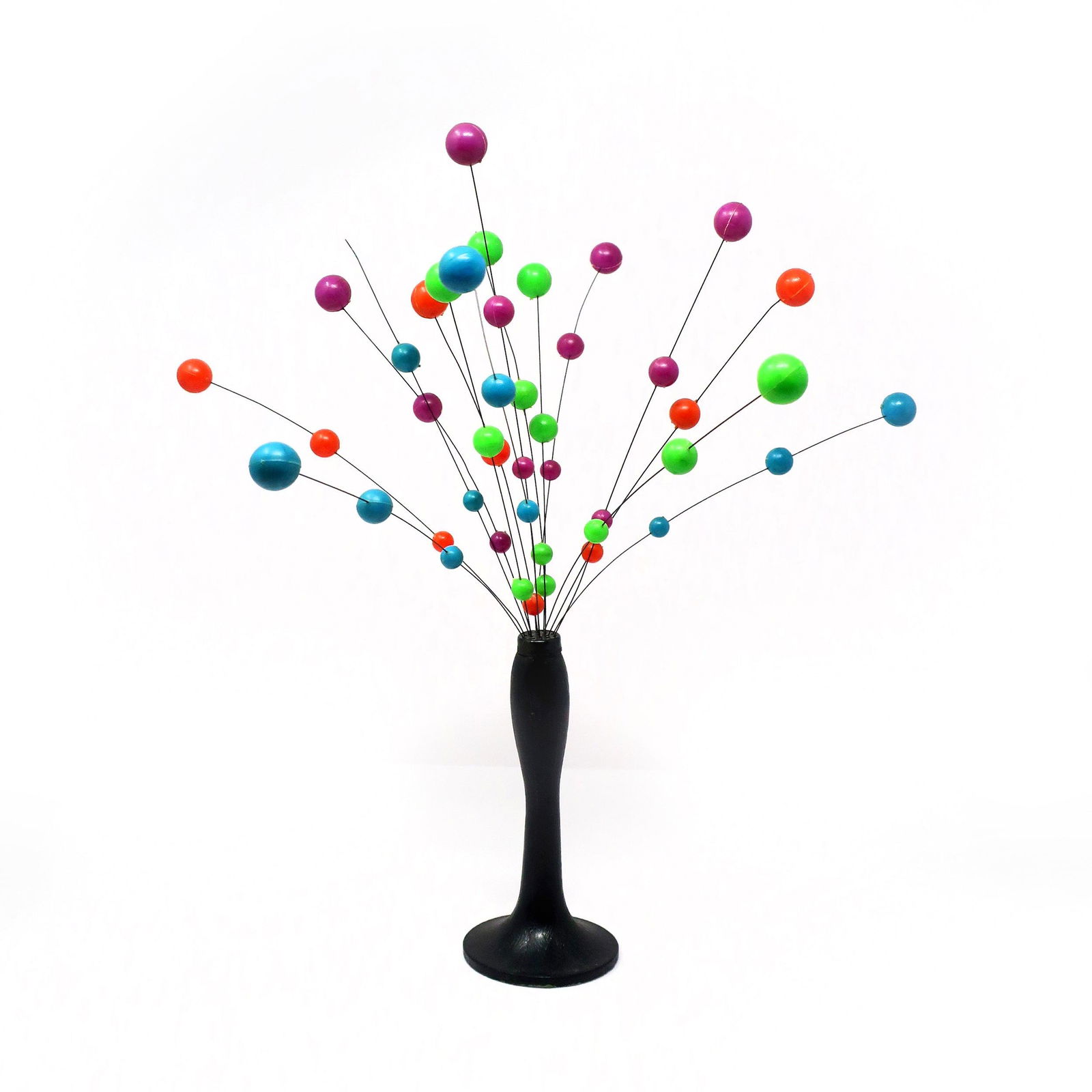 1960s Danish Modern Multicolor Kinetic Ball Sculpture: A vintage kinetic ball sculpture in the style of Laurids Lonborg, a Danish housewares and decorative objects powerhouse. Black metal base and stem, silver metal wires, and green, blue, purple and oran