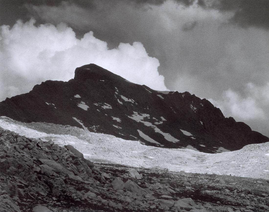 ANSEL ADAMS - Black Giant, King's Canyon, 1930: Artist: Ansel Adams Title: Black Giant Near Muir Pass, King's Canyon, 1930 Medium: Photo Litho, 1999, United Kingdom Dimensions: 6.95x5.5" Description: Heat Wax Mounted on 8.5x11" Conservation Board A