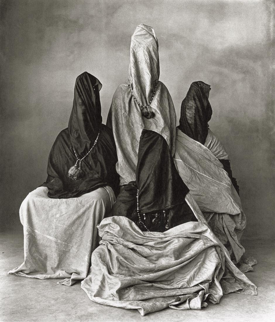 IRVING PENN - Four Guedras, Morocco, 1971: Artist: Irving Penn Title: Four Guedras, Morocco, 1971 Medium: Photo Litho, 2017, Italy Dimensions: 7.95x9.3" Description: Heat Wax Mounted on 11x14" Conservation Board Artist Bio: Irving Penn (1917-2