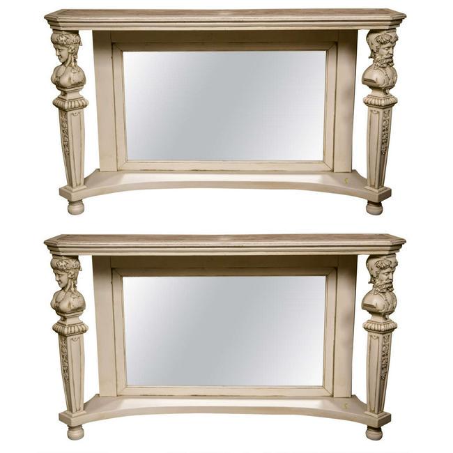 Pair of Marble-Top Painted Pier Console Tables: Each distress painted off-white, the oblong marble insert on top, supported on a mirrorred backsplat and two front columns headed on figural motifs, joint with a lower platform, raised on bun feet. Di
