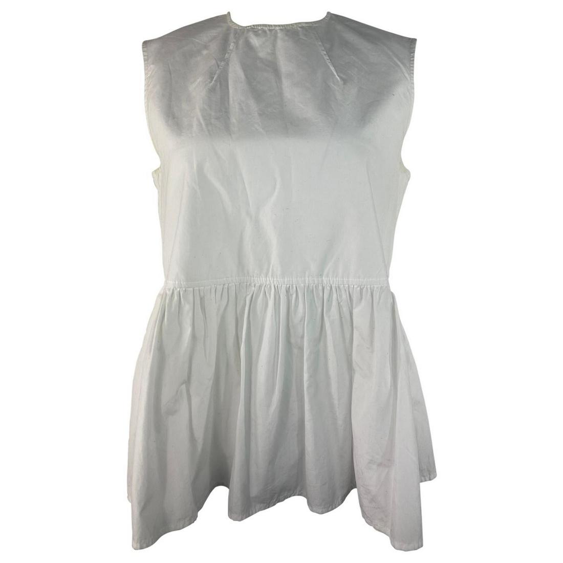 MARNI White Cotton Top Blouse, Size 40: Product details: The blouse feature crew neck line, sleeveless design with flare detail from the waist down to the bottom of the top and it has rear zip closure. Made in Italy Details: Designer: Marni