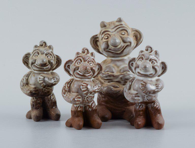 Michael Andersen Ceramics from Bornholm. Three hand-painted figures. Designed by Ludvig Mahler.: Michael Andersen Ceramics from Bornholm. Three hand-painted figures. Designed by Ludvig Mahler. "Krøllebølle"-family. Largest measuring: 11 cm x 8 cm. In perfect condition. Reserve: $140.00