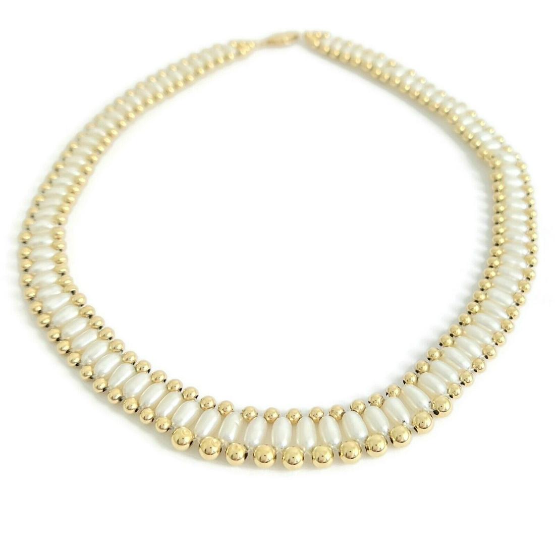 Vintage Baroque Pearl Gold Bead Necklace 14K Yellow Gold 15 Inches, 14.01 Grams: Vintage Baroque Pearl Gold Bead Necklace 14K Yellow Gold 15 Inches, 14.01 Grams This is a gorgeous pearl necklace! Pearls: 88 baroque pearls, 5.5 mm x 3.5 mm - 7 mm x 4 mm Metal: 14K yellow gold Weigh