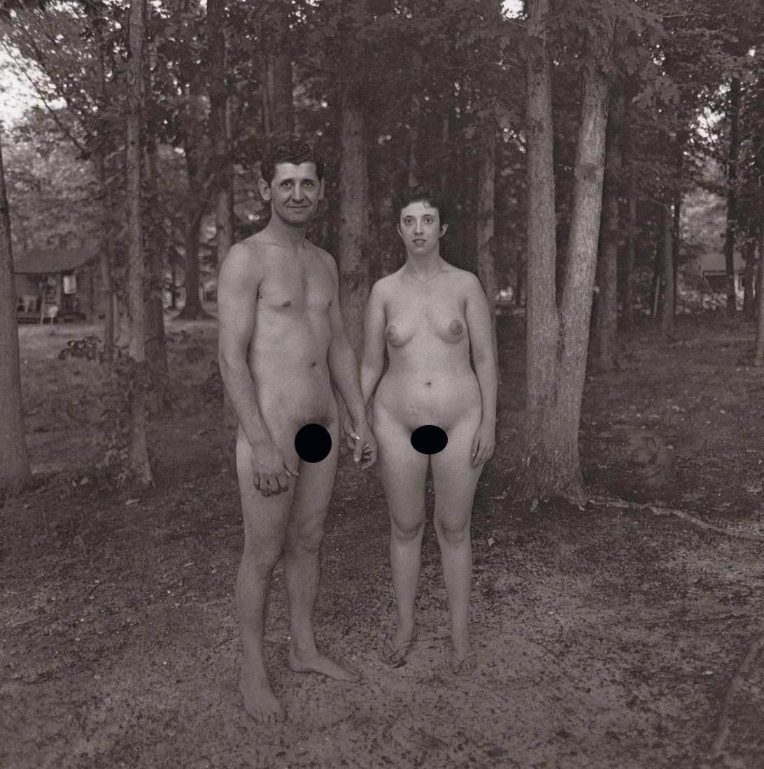 DIANE ARBUS - Husband and wife in the woods at a Nudist Camp, NJ, 1963 (1 of 2)