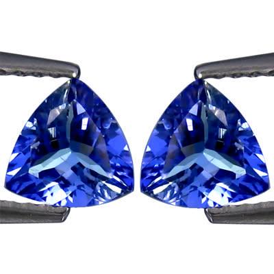 Pair of Natural Tanzanite 0.46tcw Trillion Bluish Violet: Title: Pair of Natural Tanzanite 0.46tcw Trillion Bluish Violet Additional Information: 1 x Pair of (2 Stones) Natural Tanzanite 0.46tcw Trillion Bluish Violet - Shape: Trillion - Weight: 0.46tcw - Co
