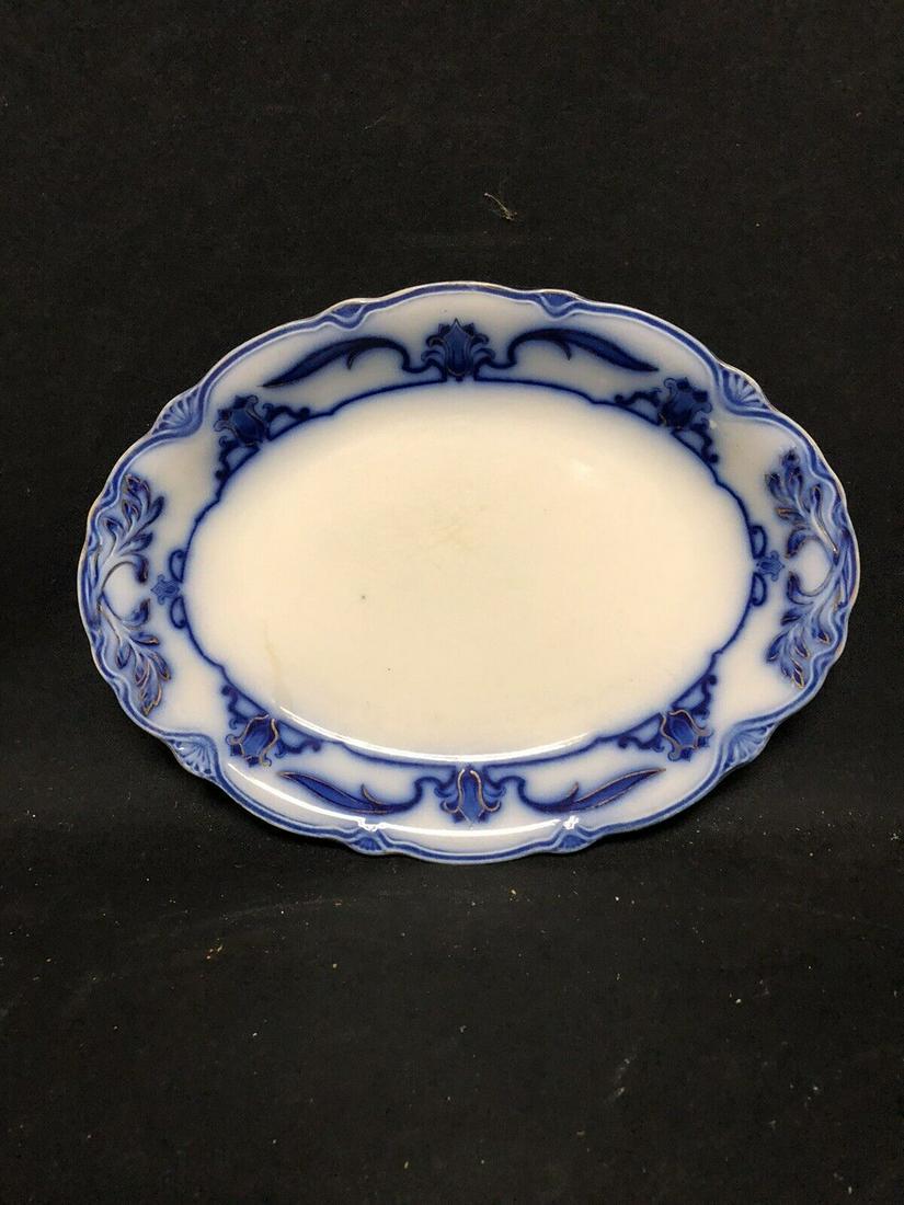 12 1/8” Flow Blue Platter: It measures 12 1/8” x 9 1/8” and is marked. It has no chips, cracks or repairs Shipping: Domestic: Flat-rate of $15.00 to anywhere within the contiguous U.S. International: Foreign shippin