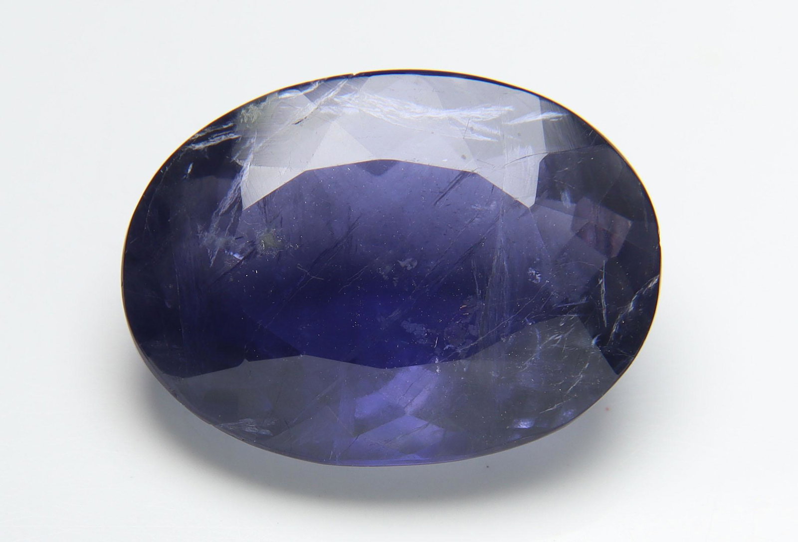 AAA Big Size 16.80 cts Natural Iolite: No Reserve! Title: AAA Big Size 16.80 cts Natural Iolite Additional Information: Gemstone : Natural Iolite Shape and cut : Oval Cut Weight : 16.80 carats Measurements : 21.54x15.86x8.60 mm , Color : V