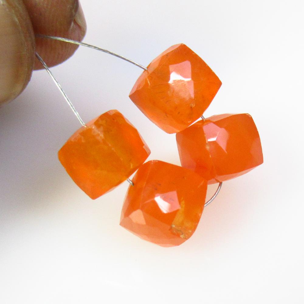 16.20 Ctw Natural 4 Drilled Orange Carnelian Square Beads: No Reserve! Title: 16.20 Ctw Natural 4 Drilled Orange Carnelian Square Beads Stone Clarity: Semi-Transparent Gemstones: Natural Carnelian Beads Carat Weights: 16.2 Size/Dimensions: 7.0x7.0 - 7.6x7.4 m