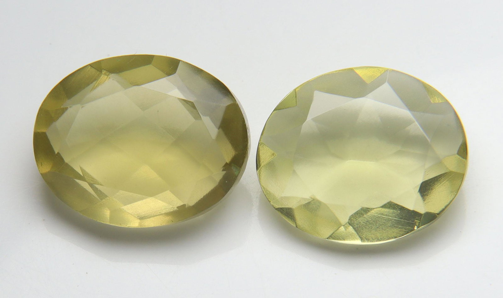 10.85 cts Natural Lemon Quartz Set: No Reserve! Title: 10.85 cts Natural Lemon Quartz Set Additional Information: Gemstone: Natural Lemon Quartz Origin: Africa Weight : 10.85 carats Measurements: 13.33x10.69x5.87 mm, 13x11 mm Shape / Cu