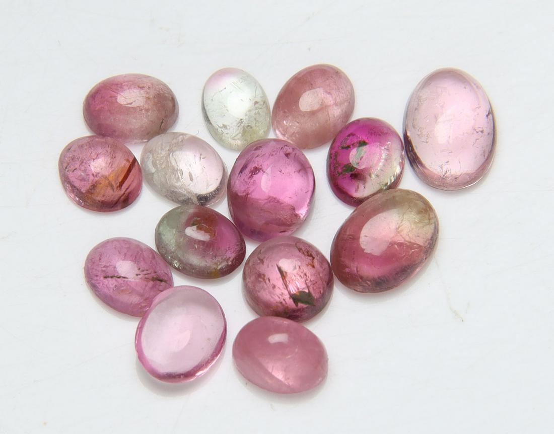 3.23 Cts Natural Rubelite Tourmaline Lot: No Reserve! Title: 3.23 Cts Natural Rubelite Tourmaline Lot Additional Information: Gemstone : Natural Rubelite Tourmaline Shape and Cut : Oval Cabochan Weight : 3.23 carats Measurements : 5.59x4.05x2