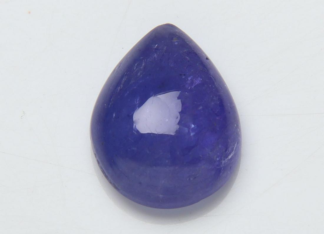 3.11 Cts Natural Tanzanite: No Reserve! Title: 3.11 Cts Natural Tanzanite Additional Information: Gemstone : Natural Tanzanite Origin: Tanzania Weight : 3.11 carats Dimensions : 11.10x8.53x4.08 mm Shape/Cut: Pear Cabochan Color 