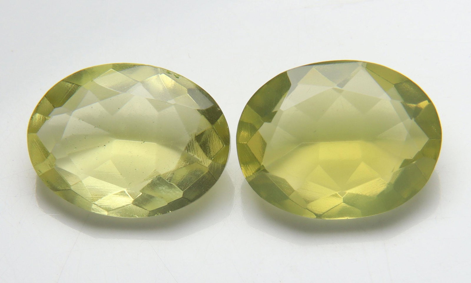 10.36 cts Natural Lemon Quartz Set: No Reserve! Title: 10.36 cts Natural Lemon Quartz Set Additional Information: Gemstone: Natural Lemon Quartz Origin: Africa Weight : 10.36 carats Measurements: 13.70x10.61x5.65 mm, 13.68x10.36x5.62mm 