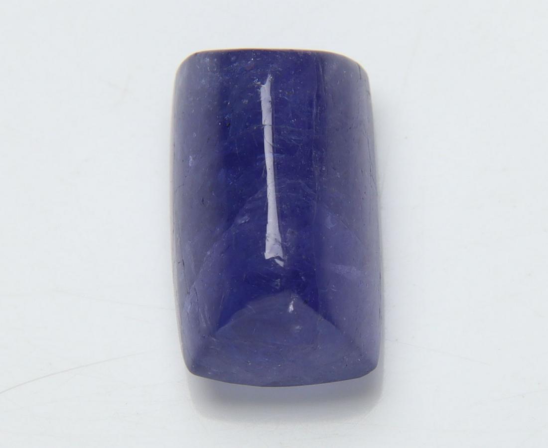 6.98 Cts Natural Tanzanite: No Reserve! Title: 6.98 Cts Natural Tanzanite Additional Information: Gemstone : Natural Tanzanite Origin: Tanzania Weight : 6.98 carats Dimensions : 12.40x7.61x7.34 mm Shape/Cut: Rectengular Cabochan