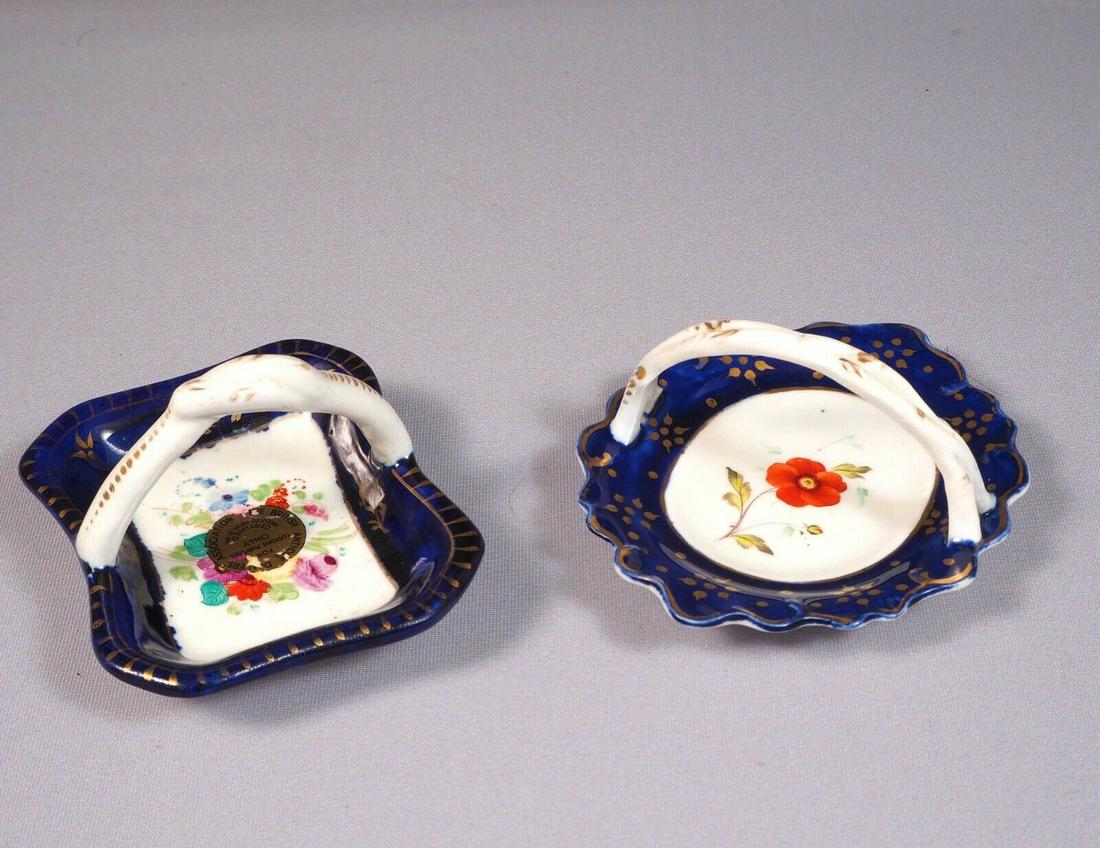 2 Antique Porcelain Cobalt Basket Tray Candy Nut Dish Set Handles Certified 1841: This is an exceptional Set of 2 (two) small Baskets/Nut Dishes/Trays. They are in cobalt blue and gold. One of them bears and British antique Dealers Association certifying that is made prior to 1841.