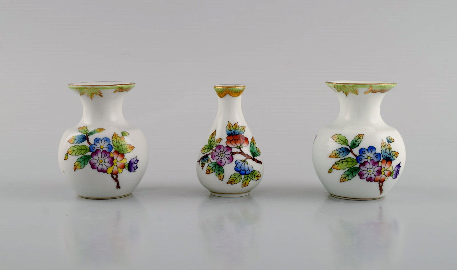 Three Herend porcelain vases with hand-painted flowers and butterflies. Mid-20th century. (1 of 4)