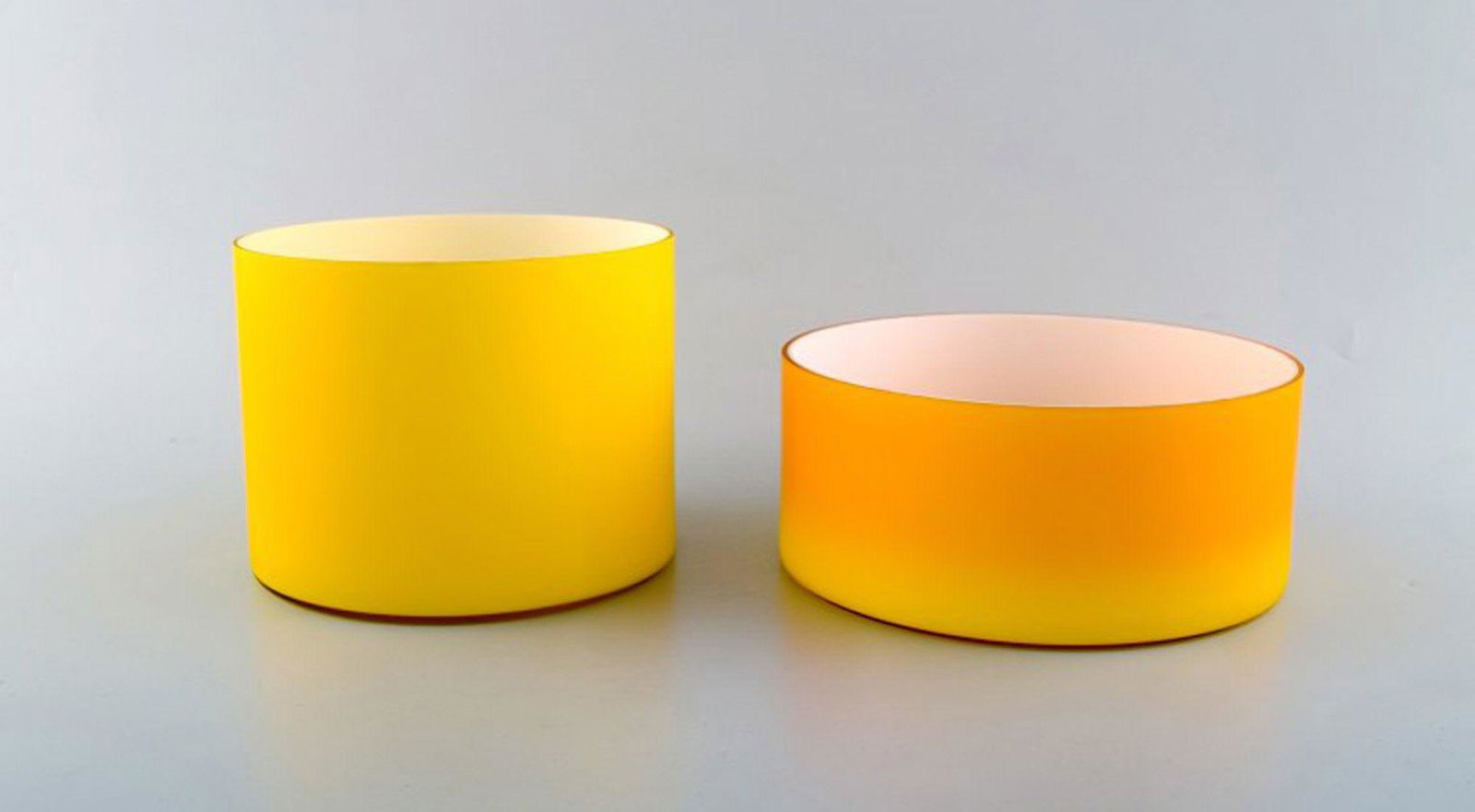 Kastrup / Holmegaard. A pair of large bowls in yellow opaline glass. 1960's.: Kastrup / Holmegaard. A pair of large bowls in yellow opaline glass. danish design, 1960's. In good condition. Sticker. Largest measures: 18 x 8 cm. Smallest measures: 15 x 12 cm. Reserve: $238.00 Shi