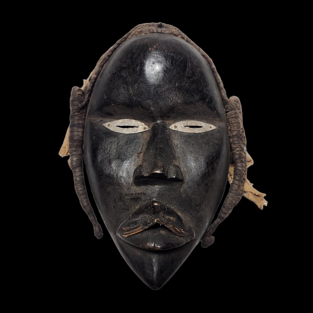 Dan Mask: Title: Dan Mask Date/Period: 19th Century Materials/Origin: Ivory Coast, Africa Dimensions: 6in X 2.5in X 8.5in Reserve: $80.00 Shipping: Domestic: Flat-rate of $20.00 to anywhere within the contigu