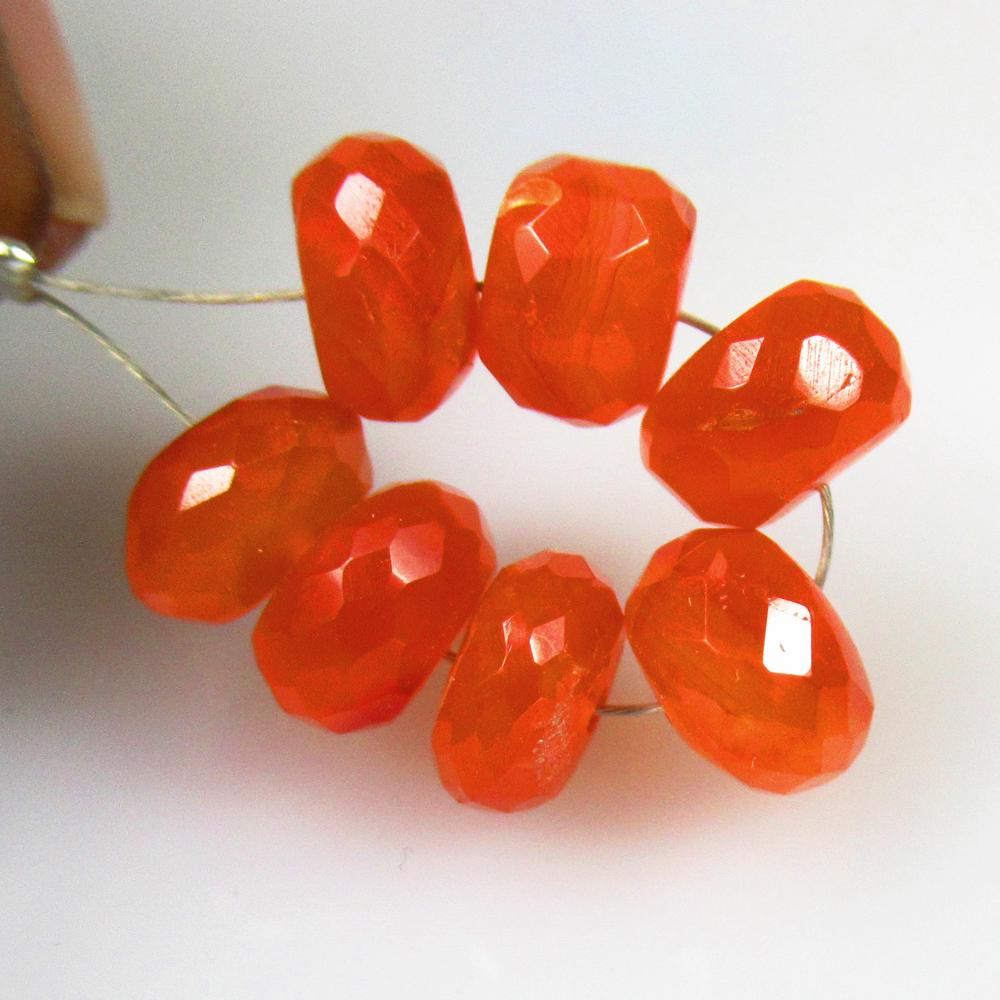 16.57 Ctw Natural 7 Orange Carnelian Round Beads: No Reserve! Title: 16.57 Ctw Natural 7 Orange Carnelian Round Beads Stone Clarity: Semi-Transparent Gemstones: Natural Carnelian Beads Carat Weights: 16.57 Size/Dimensions: 7.40 - 8.30 mm / 7 Pc's Add