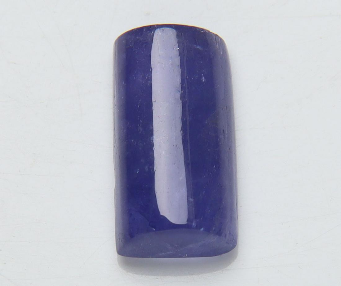 3.42 Cts Natural Tanzanite: No Reserve! Title: 3.42 Cts Natural Tanzanite Description: Gemstone : Natural Tanzanite Origin: Tanzania Weight : 3.42 carats Dimensions : 12x6 mm Shape/Cut: Rectengular Cabochan Color : Violet Transp