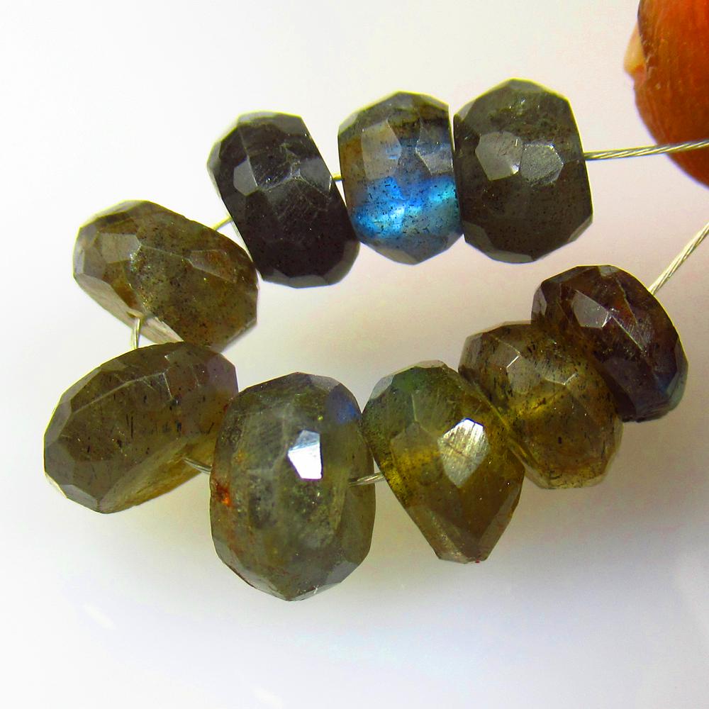 13.00 Ctw Natural 9 Labradorite Round Beads: No Reserve! Title: 13.00 Ctw Natural 9 Labradorite Round Beads Stone Clarity: Opaque Gemstones: Natural Labradorite Beads Carat Weights: 13 Size/Dimensions: 6.00 - 7.80 mm / 9 Pc's Additional Informat