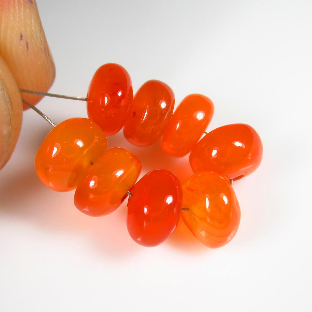 Natural Carnelian Beads - 13.16 Ct: No Reserve! Title: Natural Carnelian Beads - 13.16 Ct Origin: Brazil Weight: 13.16 Size/Dimensions: 7.0 - 7.5 mm Additional Information: Pieces : 8 No's / Shape : Drilled Round Beads / Color : Orange 