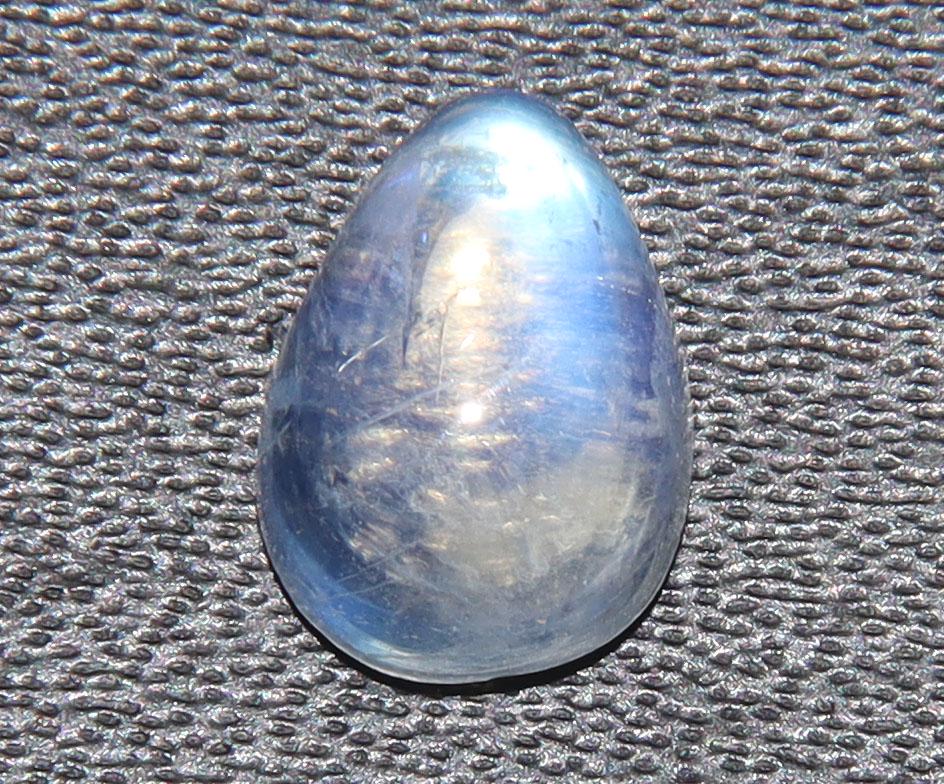 1.70 Cts Natural Rainbow Moonstone: No Reserve! Title: 1.70 Cts Natural Rainbow Moonstone Description: Gemstone : Natural Rainbow Moonstone Shape : Pear Cabochan Weight : 1.70 carats Measurements : 9x6 mm, Color : White Transparency : O