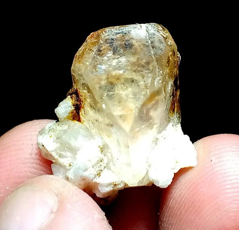 06 Grams Lovely Natural Color Topaz Specimen From Skardu Pakistan: Materials: Topaz Specimen Description 06 Grams Lovely Natural Color Topaz Specimen From Skardu Pakistan SIZE 20*20*17 mm Reserve: $18.00 Shipping: Domestic: Flat-rate of $10.00 to anywhere withi