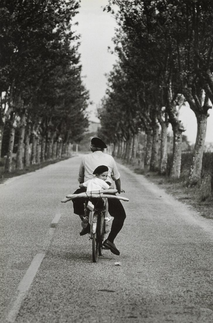 ELLIOTT ERWITT - Provence, France, 1955: Artist: Elliott Erwitt Title: Provence, France, 1955 Medium: Photo Litho, 2001, Italy Dimensions: 6.75x10.2" Description: Heat Wax Mounted on 11x14" Conservation Board Artist Bio: Elliott Erwitt (1928